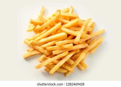 Fresh oven baked healthy potato chips, french Fries or Pommes Frites in a pile on white for a menu