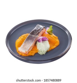 Fresh Oven Baked Wild Salmon Slice On Mashed Carrots Puree In Grey Plate Isolated On White Background