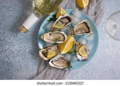 fresh oysters, lemon white wine