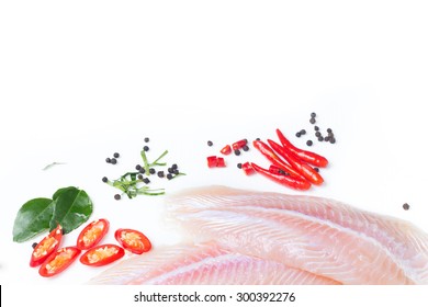 Fresh Pangasius Dory Or Basa Fish Fillet With Ingredient Herb On White Isolated