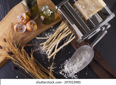 Fresh Pasta Making Of Homemade Fresh Pasta Tagliatelle With Egg And Flour Overhead Angle