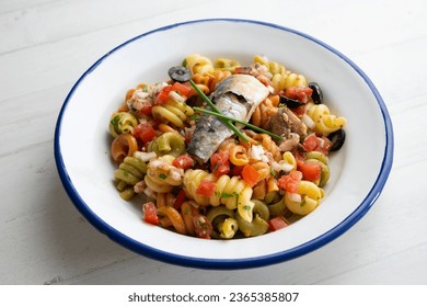 Fresh pasta with vegetables and sardines. - Shutterstock ID 2365385807