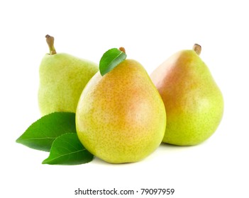 Fresh pear with green leaves isolated on white background - Shutterstock ID 79097959