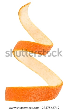Fresh peel of orange fruit isolated on a white background. Vitamin C, orange zest.