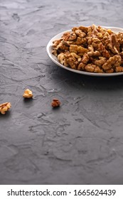 Fresh, Peeled Walnuts Before Chopping In A Blender On A Gray Background