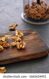 Fresh, Peeled Walnuts Before Chopping In A Blender On A Gray Background