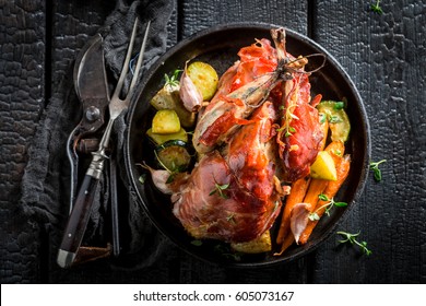 Fresh pheasant with bacon and spices and vegetables