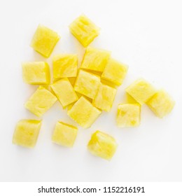 Fresh Pineapple Cube Slices Isolated On The White Background. Pineapple Chunks Close Up
