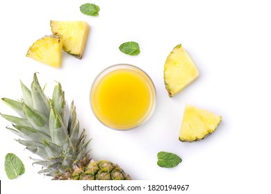 Fresh pineapple juice in glass isolated on white background. Top view.