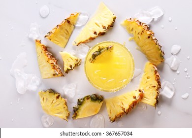 Fresh Pineapple Juice In The Glass With Slice, Top View

