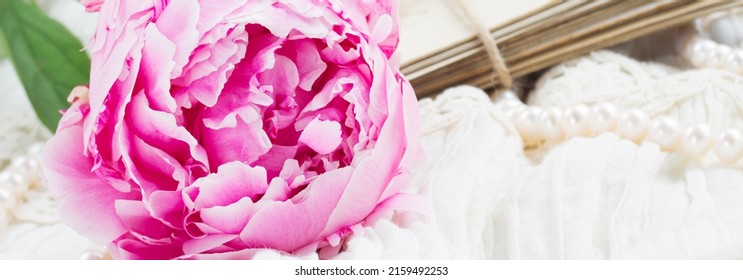 Fresh Pink Peonies With Pile Of Old Mail On White Lace Background