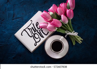 Fresh Pink Tulip Flowers Bouquet . With Inscription True Love On Paper. Spring Holiday Concept