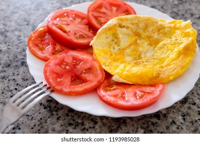 Fresh Plain Omelette With Tomatoes