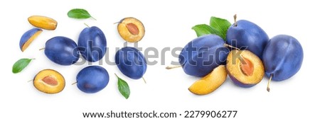 fresh plum and half with leaves isolated on white background. Top view. Flat lay