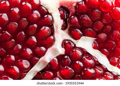 Fresh Pomegranate Seeds On The Kitchen Table, Cooking Desserts And Meat Using Pomegranate Juice, Close-up Of Pomegranate Seeds