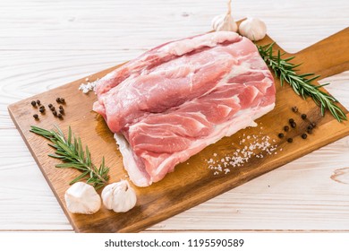 Fresh Pork Raw Fillet On Wooden Board