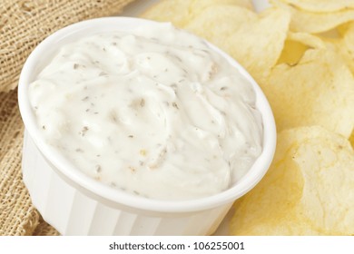 Fresh Potato Chips With Ranch Dip On A Background