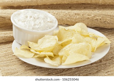 Fresh Potato Chips With Ranch Dip On A Background