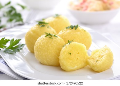 Fresh potato dumpling on a white plate