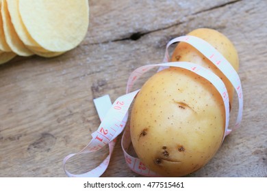 Fresh potatoes with potatoes chips