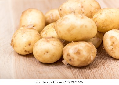 Fresh potatoes in a studio light. - Shutterstock ID 1027274665