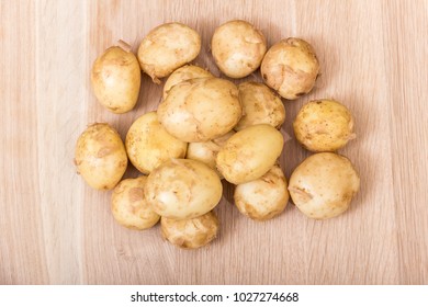 Fresh potatoes in a studio light. - Shutterstock ID 1027274668