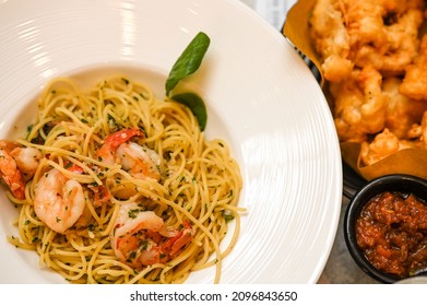 Fresh Prawns Spaghetti In White Plate, Food On Table Concept Flat Lay Top Down View