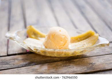 Fresh Prepared Asian Vanilla Icecream With Fried Banana Dessert. Traditional Thai Cuisine Made Of Fresh Ingredients.