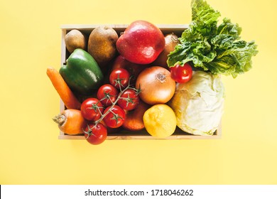 Fresh Produce Delivery Box On Yellow Background