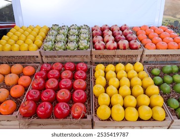 Fresh produce, fruits and vegetables, in display crates on the back of a truck for sale at a farmers market - Powered by Shutterstock