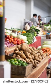 Fresh Produce In The Market. Rows Of Vegetables In The Market. Wet Market In Asia. Tomatoes, Potatoes, And Green Vegetables Sold In The Market.