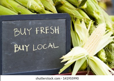 Fresh produce on sale at the local farmers market.