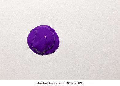 Fresh Purple Paint Drop On A Paper Sheet