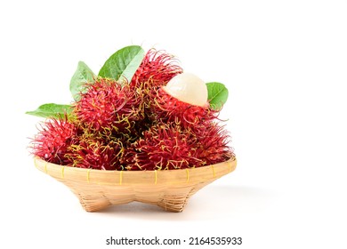 Fresh Rambutan fruits on bamboo basket isolated on white background. fruit Southeast Asia. Rambutan is very nutritious and may offer health benefits ranging from weight loss
