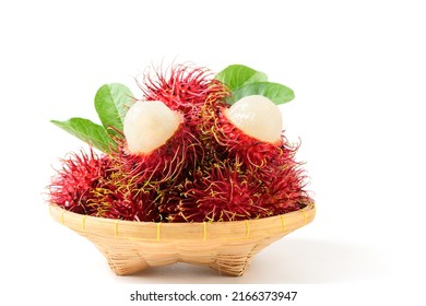 Fresh Rambutan fruits on bamboo basket isolated on white background. fruit Southeast Asia. Rambutan is very nutritious