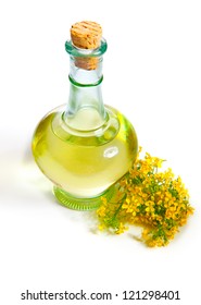 Fresh Rapeseed Oil In A Bottle, Isolated On A White Background