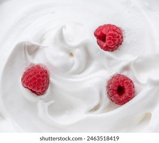 Fresh raspberries in the yoghurt or cream. Top view. - Powered by Shutterstock