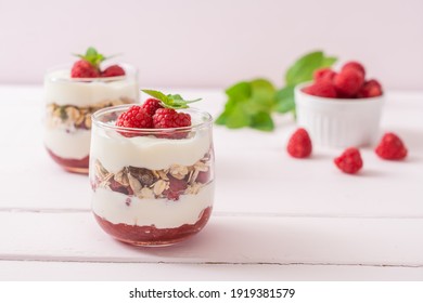 fresh raspberry and yogurt with granola - Healthy food style