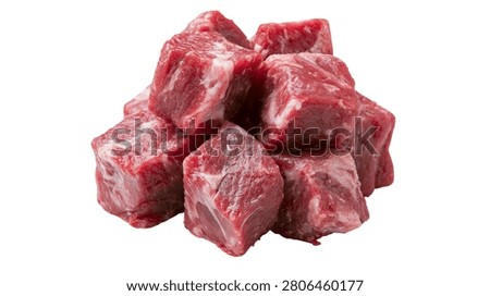Fresh raw beef meat cubes piled together for cooking