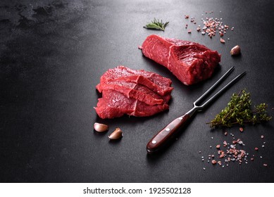 Fresh Raw Beef Meat To Make Delicious Juicy Steak With Spices And Herbs. Preparation For Grilled Meat