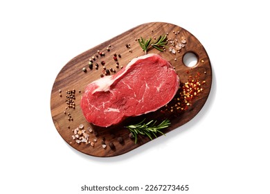 Fresh raw beef steak with spices isolated on white background. top view - Powered by Shutterstock