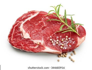 fresh raw beef steak with spices isolated on white background, top view