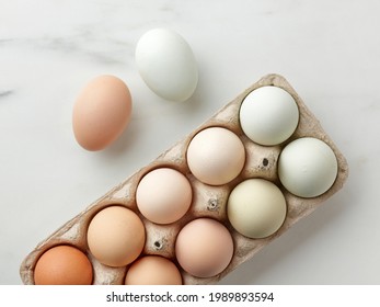 Fresh Raw Bio Eggs In Egg Box, Top View