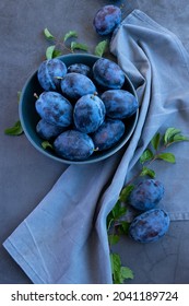 Fresh Raw Blue Plums On The Table, Monochromatic Color Image