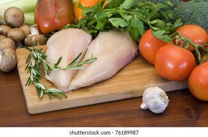 Fresh Raw Chicken Fillets And Vegetables Prepared For Cooking