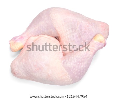 Fresh raw chicken meat, isolated on white background. Chicken drumstick or leg, top view.