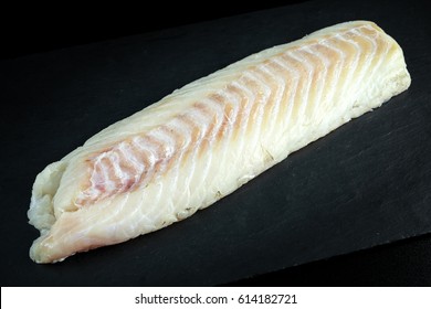 Fresh Raw Cod Loin Fillet On Stone Board