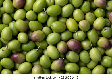 Fresh raw green olives close up full frame as background  - Powered by Shutterstock