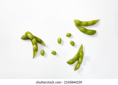 Fresh raw green soya bean isolated on white background. High anlge view of young  green soy beans peas