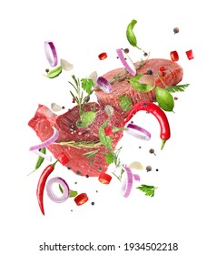 Fresh Raw Meat And Different Spices Flying On White Background